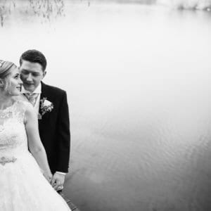 Bride And Groom By Lake Nunsmere Hall