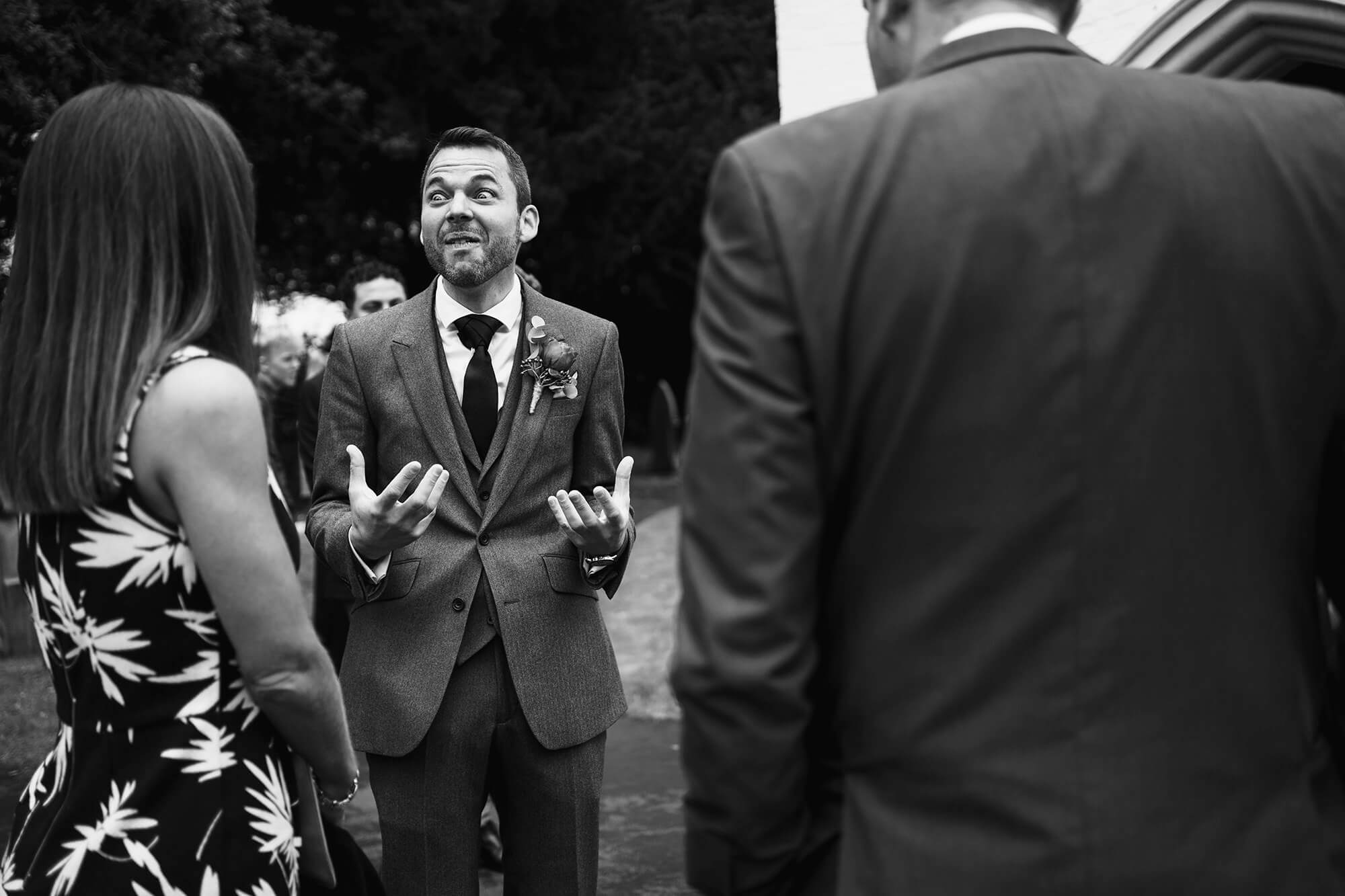 excited groom at church