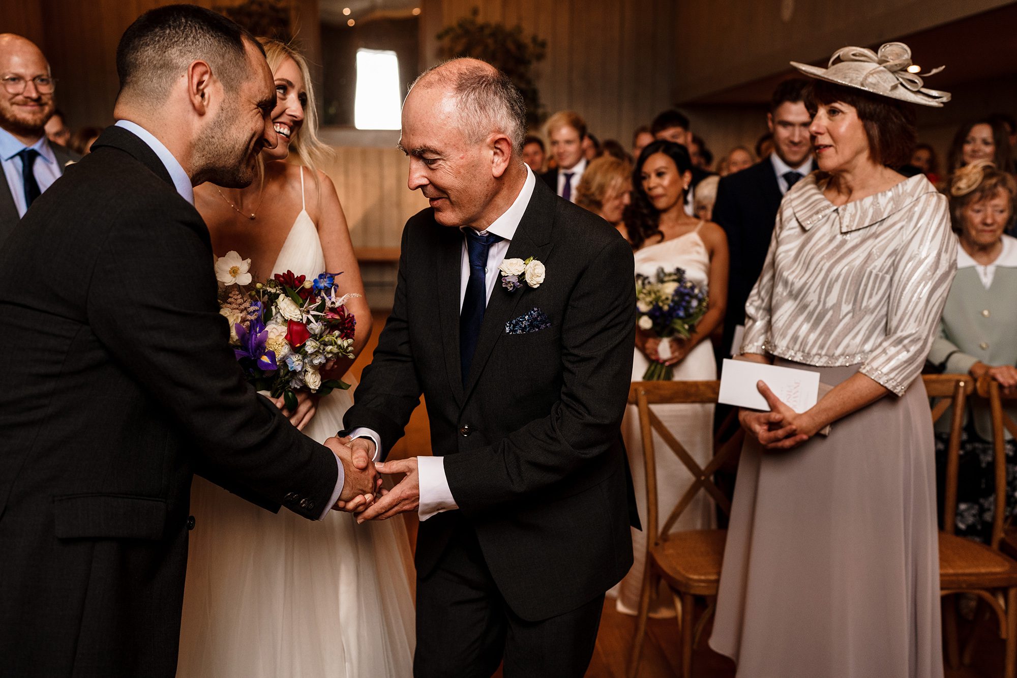 Father gives away his daughter to groom in front of emotional guests at Primrose Hill Farm.