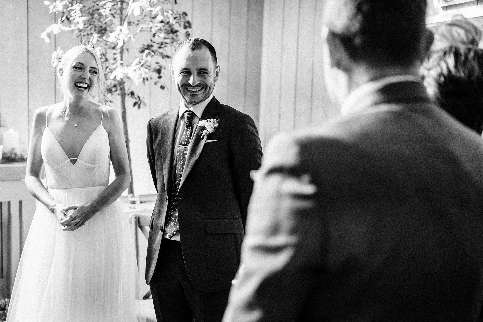 Bride and Groom are all smiles during wedding ceremony at Primrose Hill Farm.