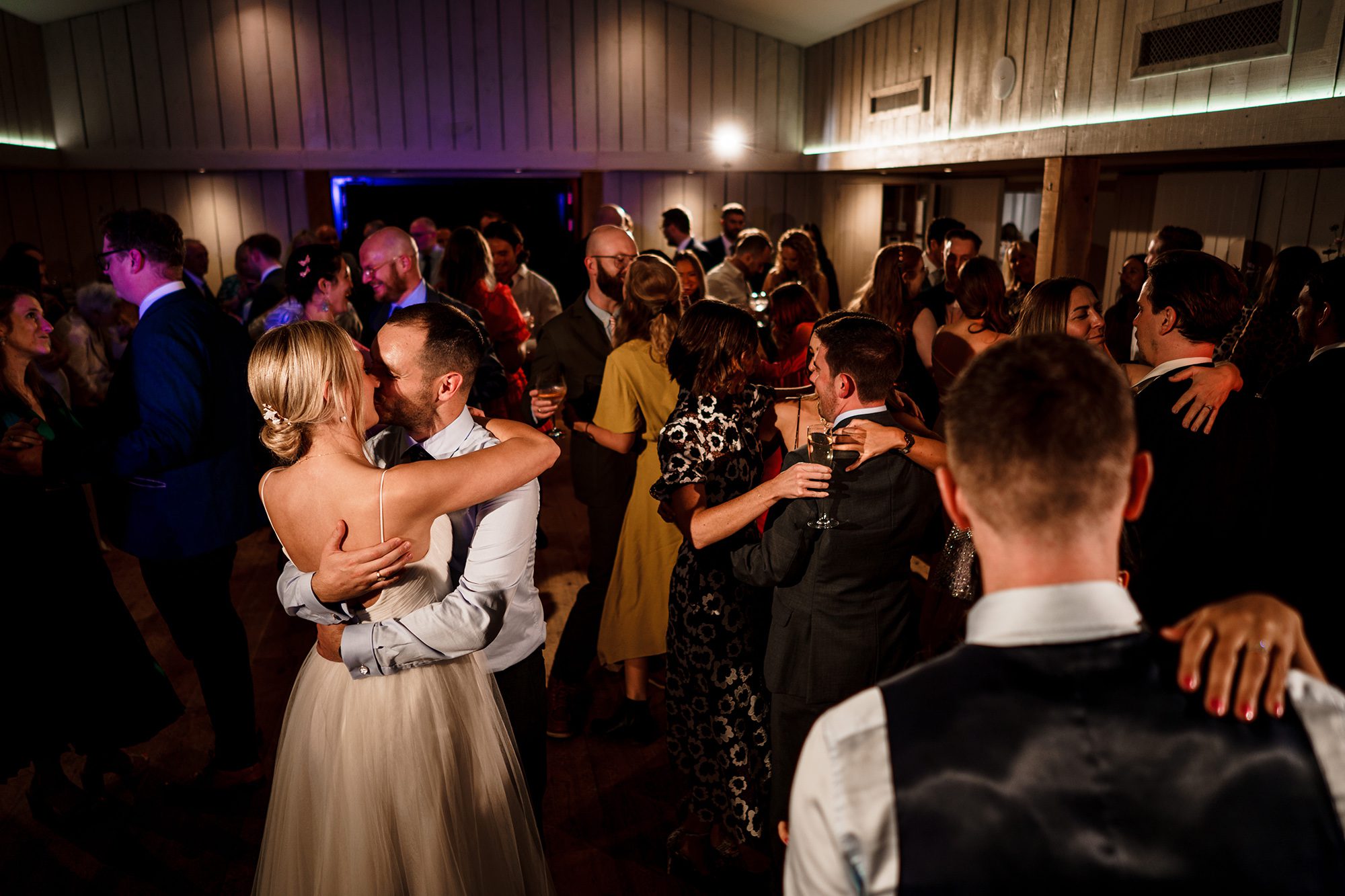 The dance floor fills at Primrose Hill Farm wedding reception.