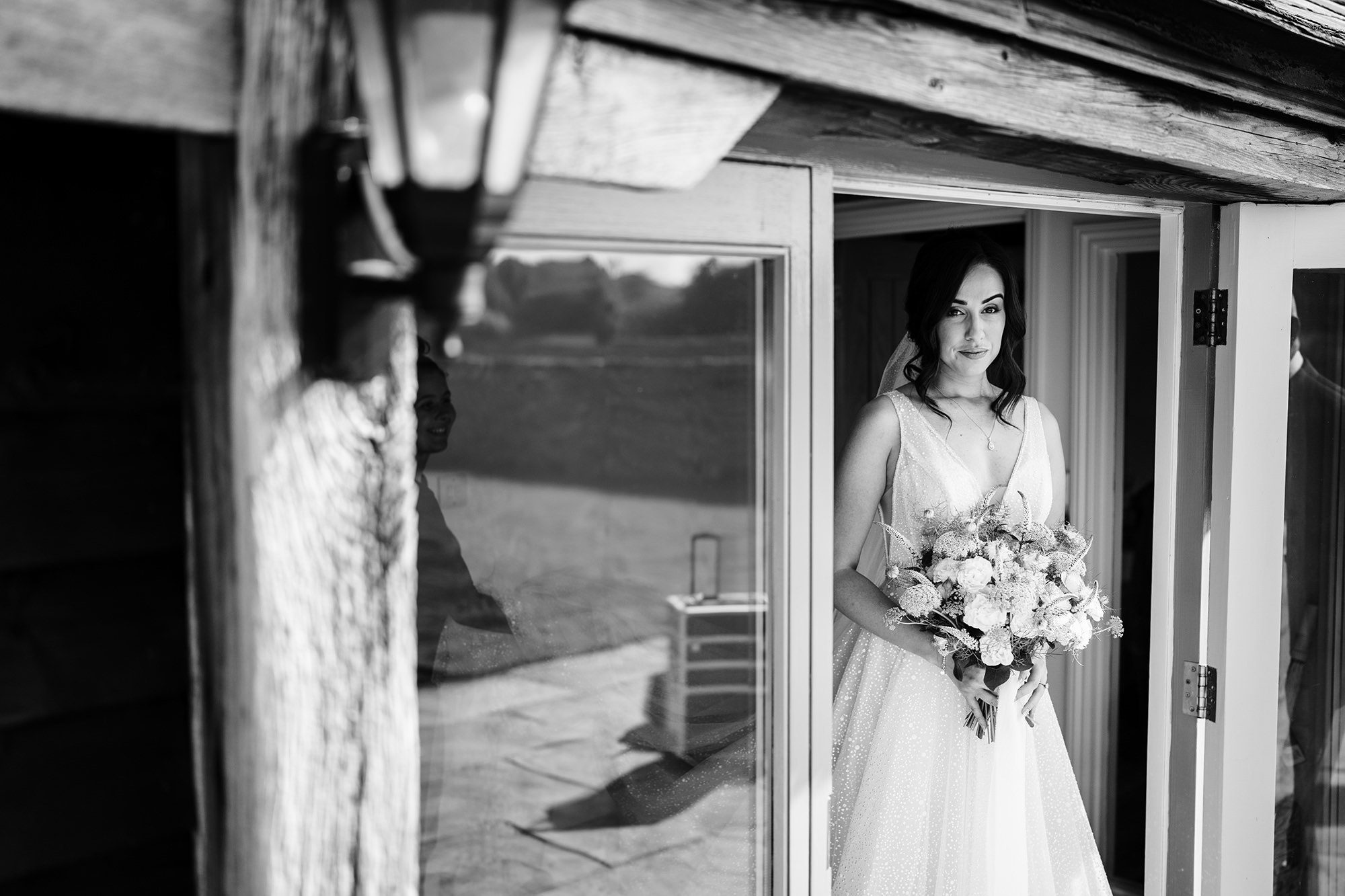 bride in her wedding dress leaving the Caswell House bridal suite