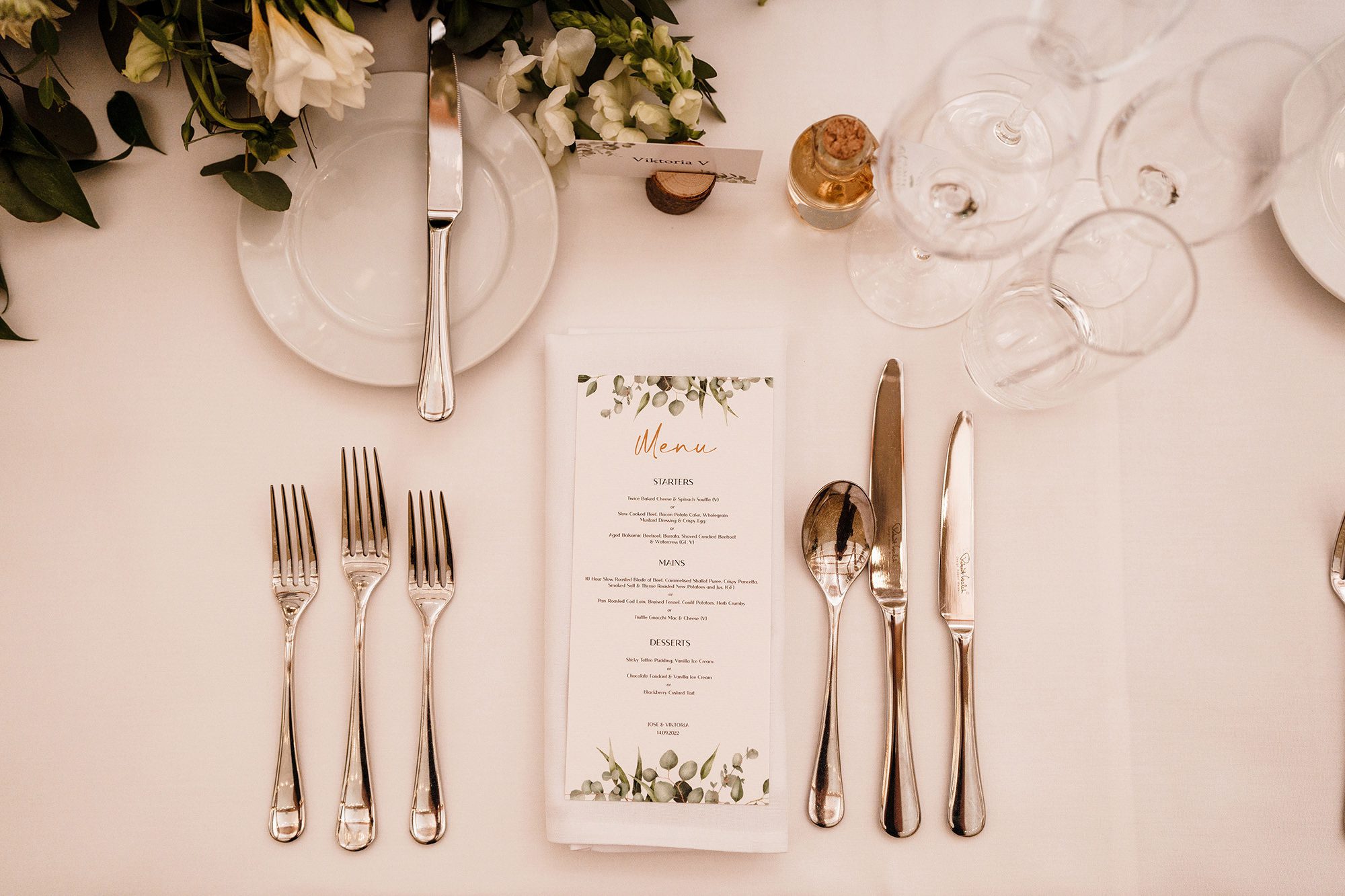 overhead photo of wedding table setup in Caswell House barn