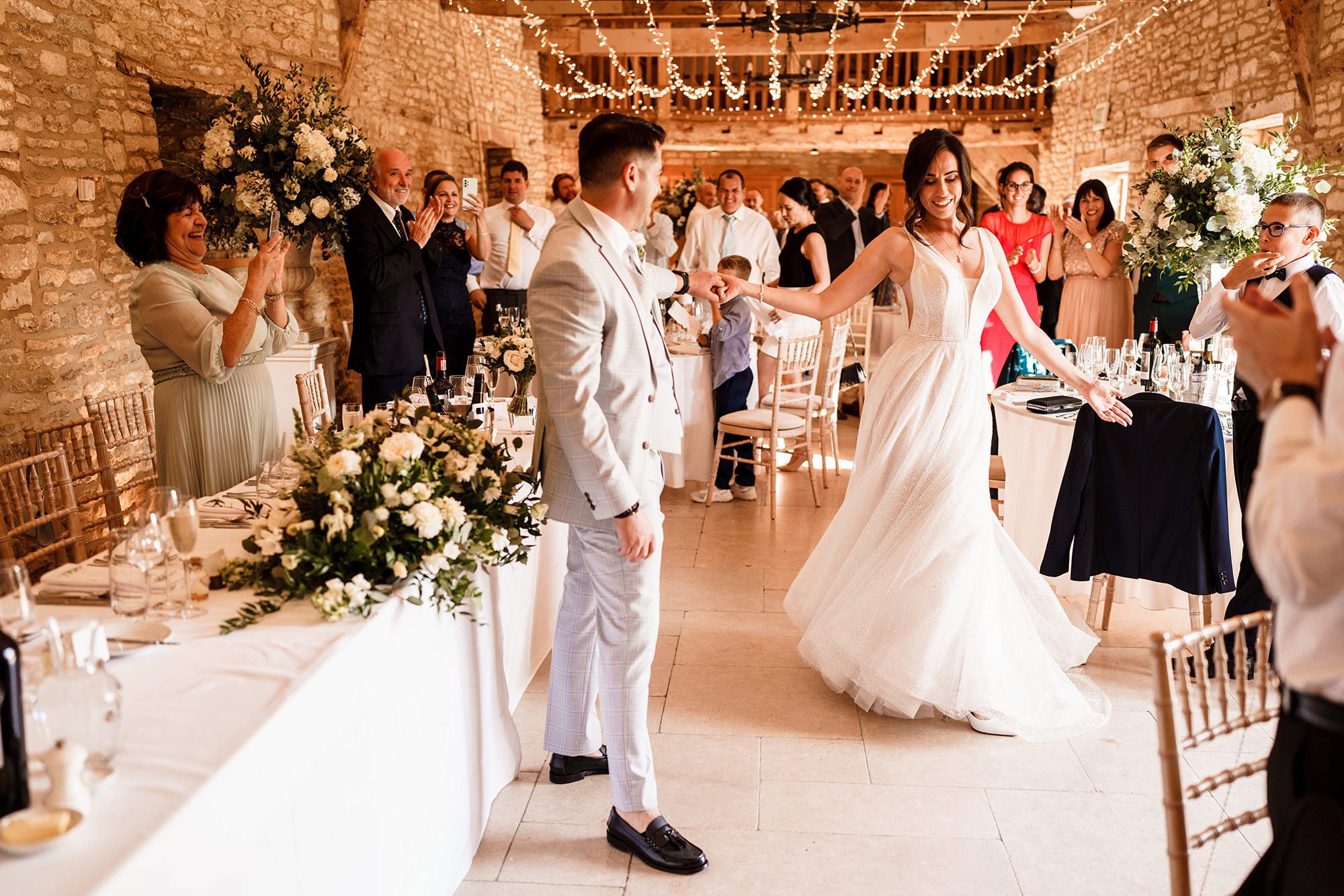 bride and groom dance inside the Caswell House wedding venue