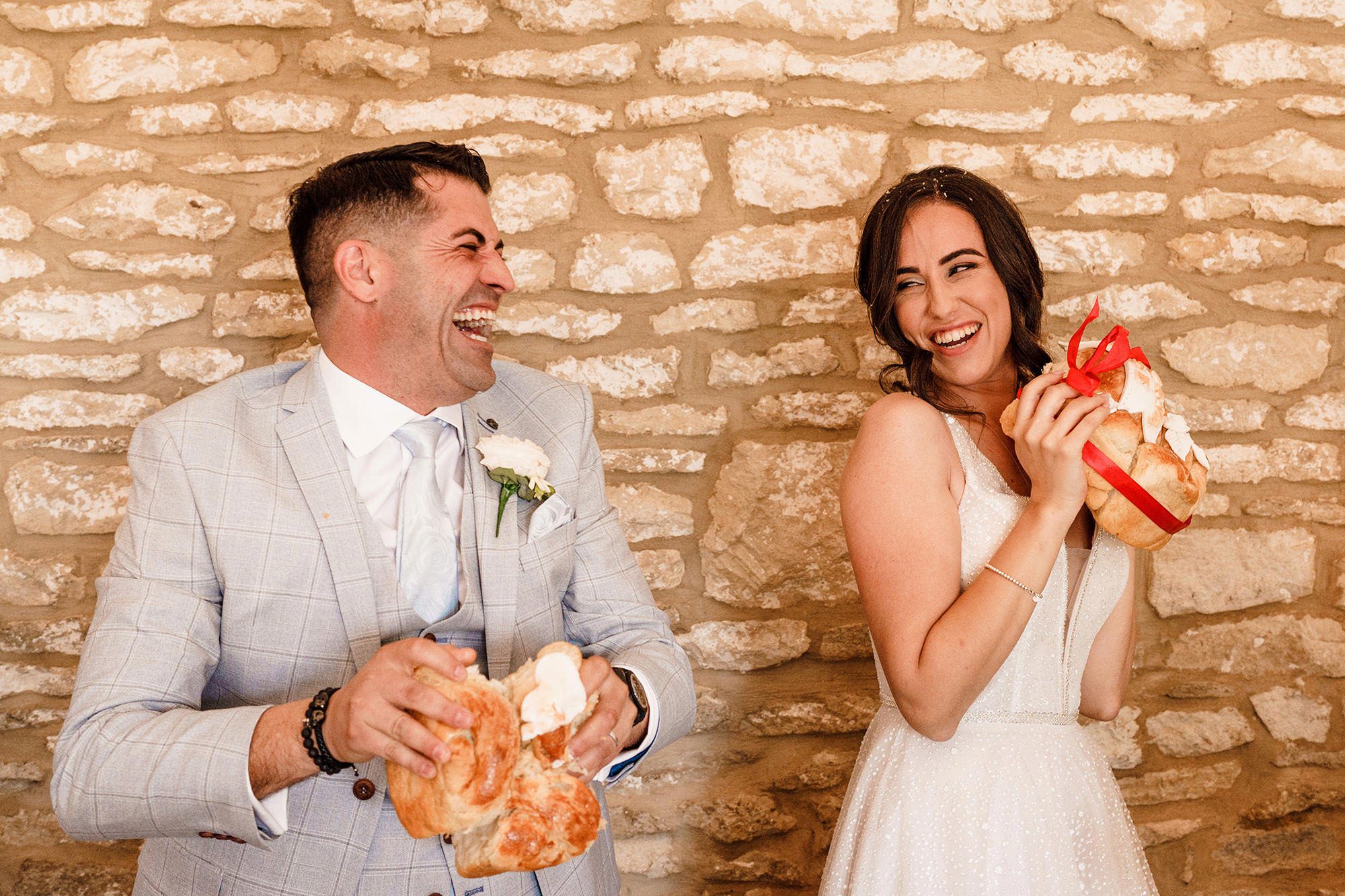 bride and groom laugh during speeches at Caswell House