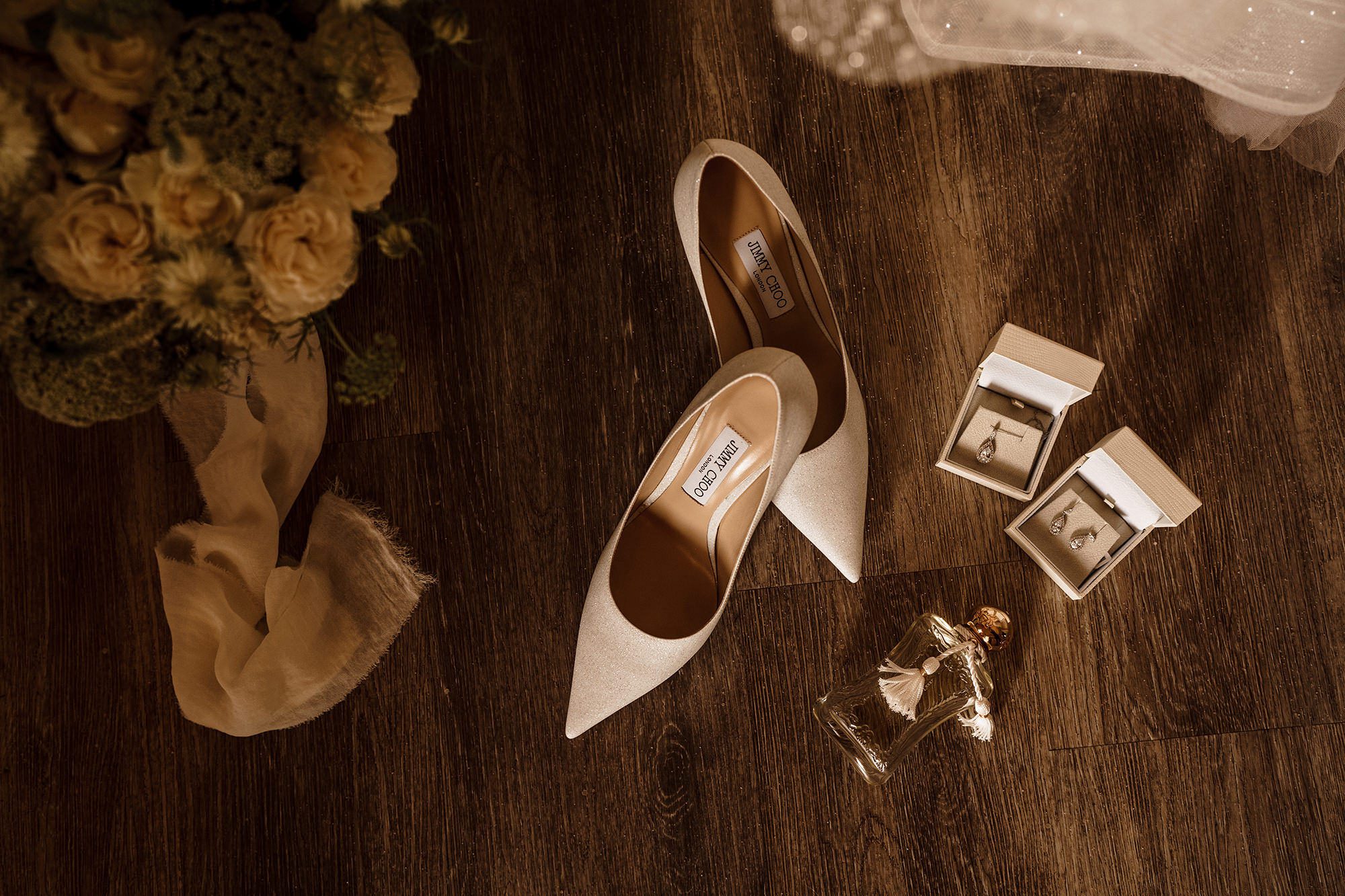brides shoes and accessories displayed for wedding photo