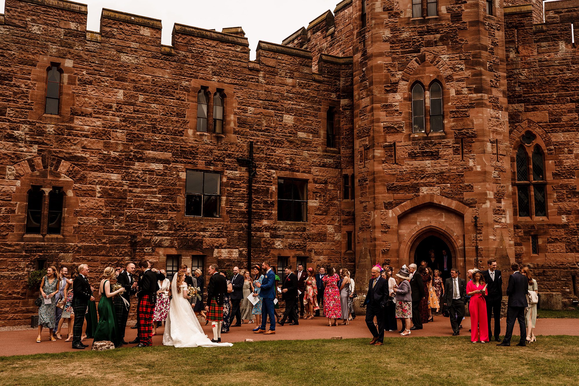 wedding guests standing in the grounds of this Cheshire wedding venue