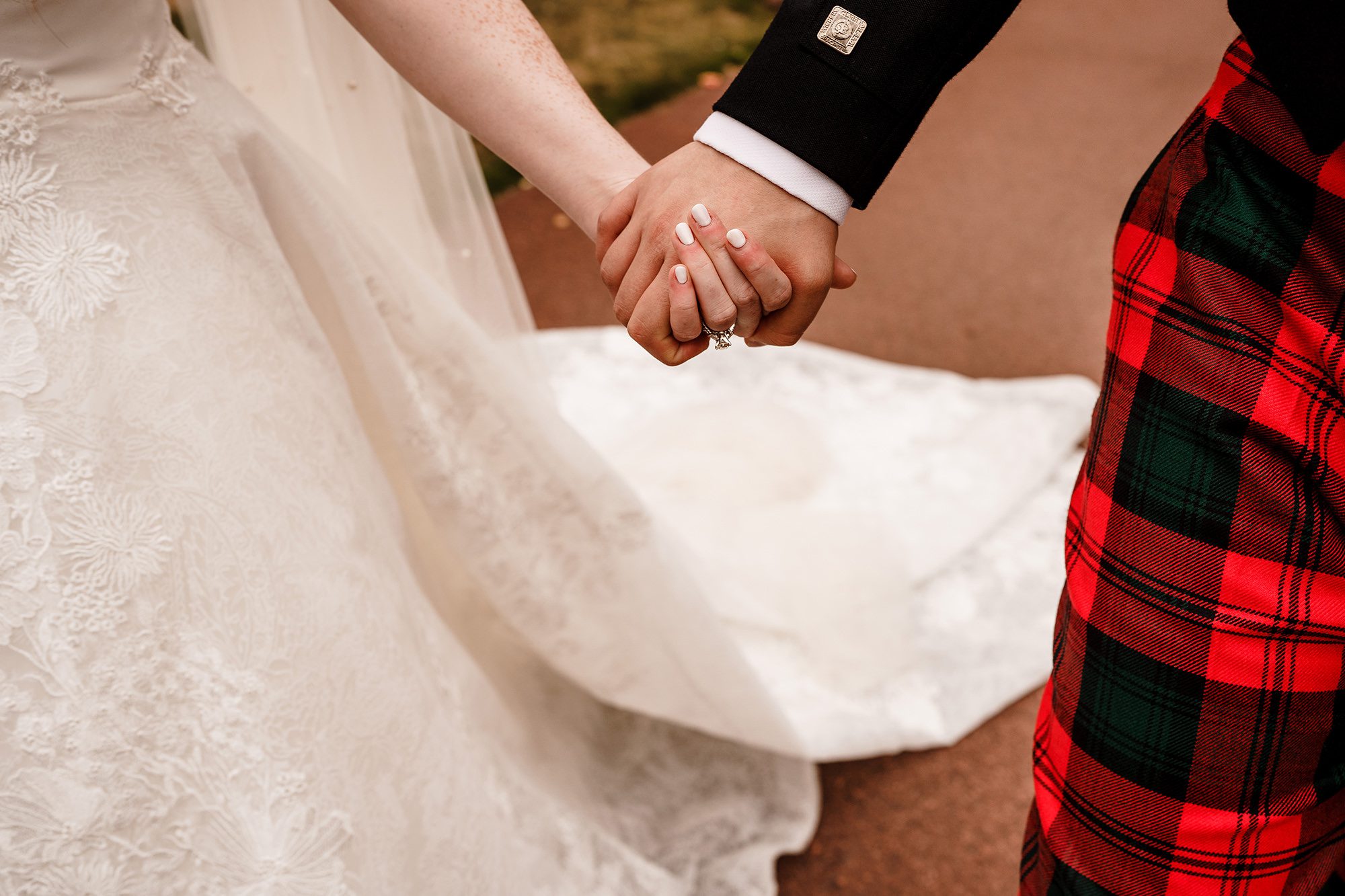 bride and grooms hands close up