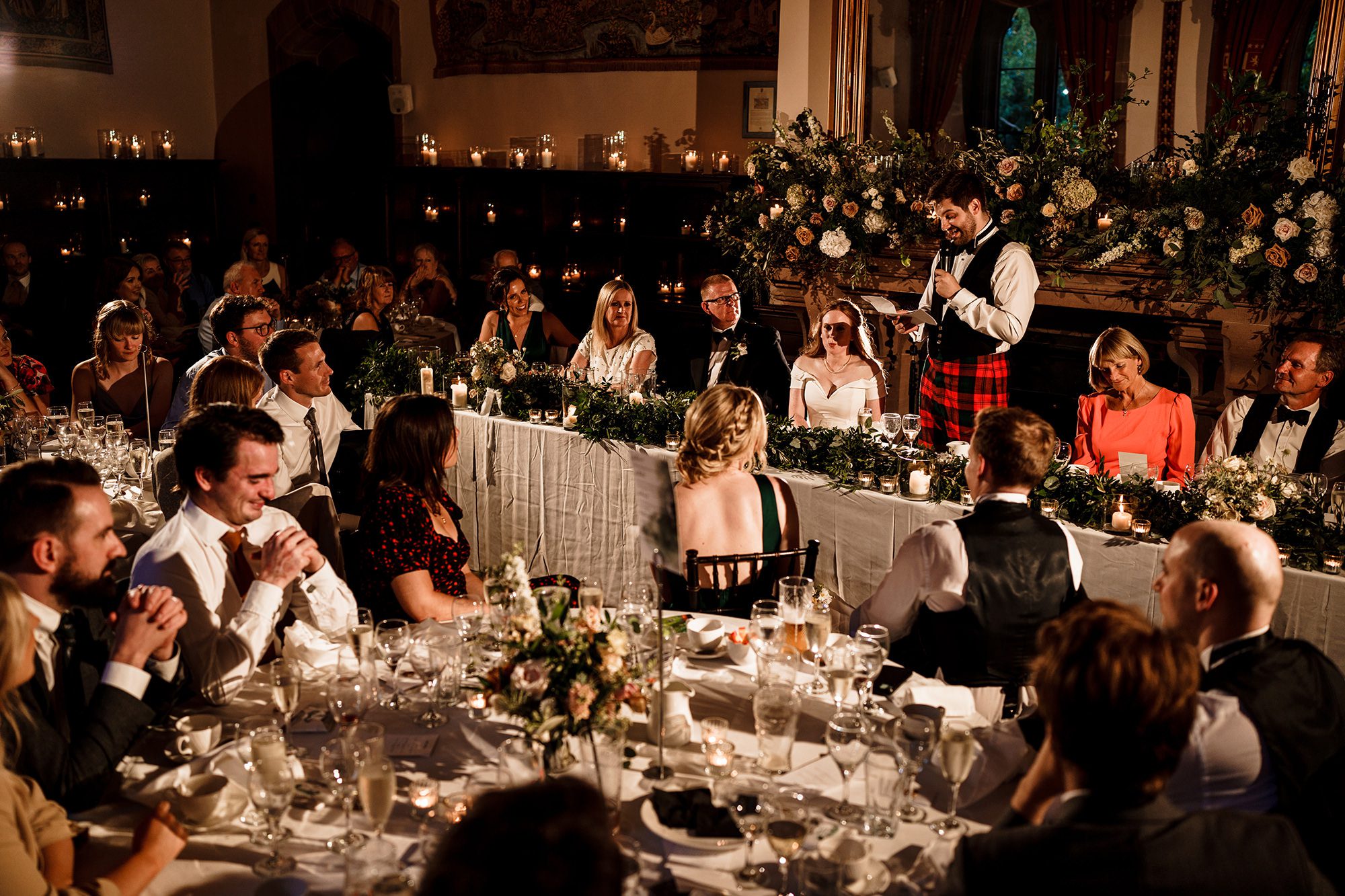 groom giving his speech infant of all wedding guests at Peckforton Castle