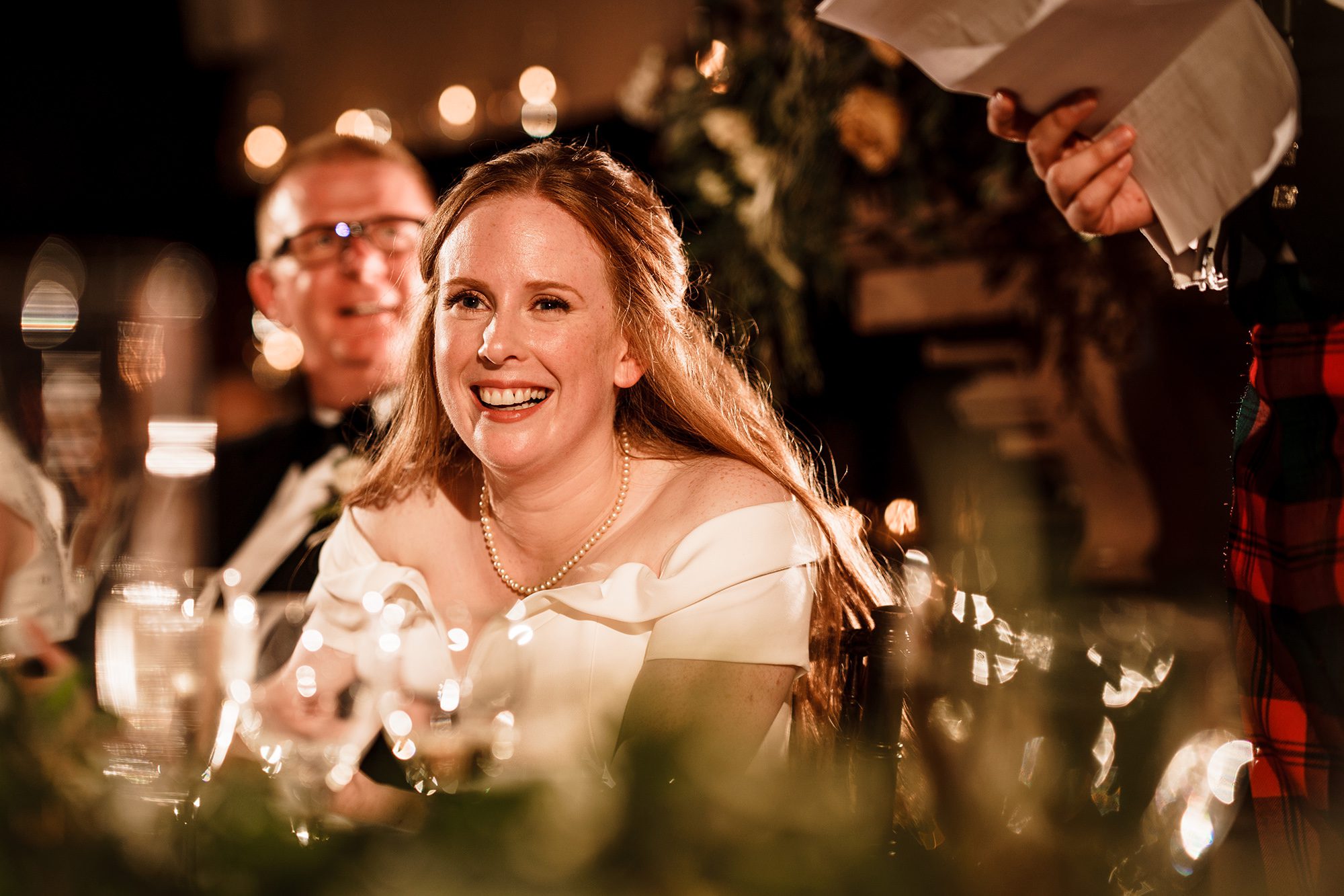 bride laughing during speeches