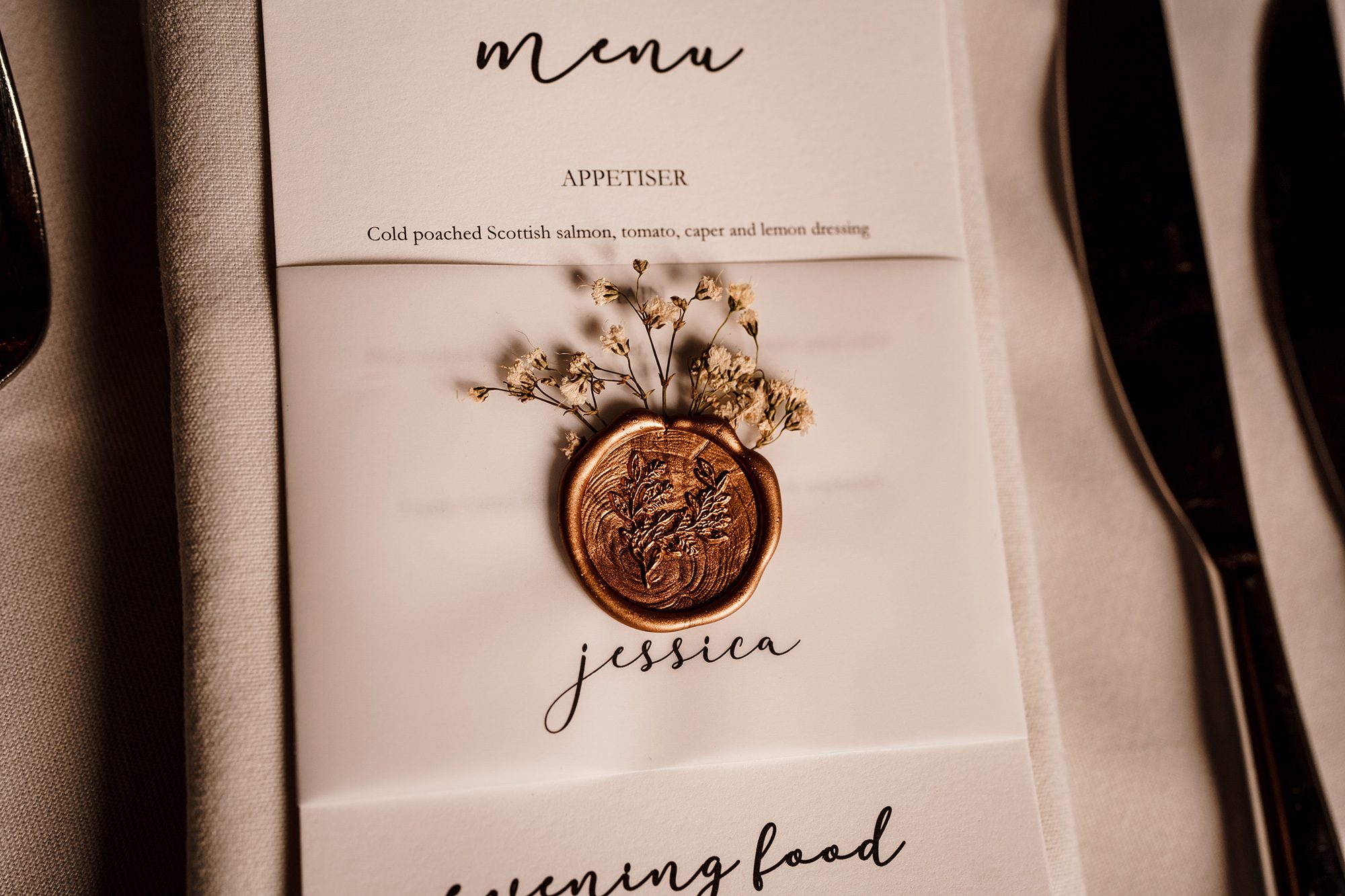 close up of a wedding food menu at Peckforton Castle
