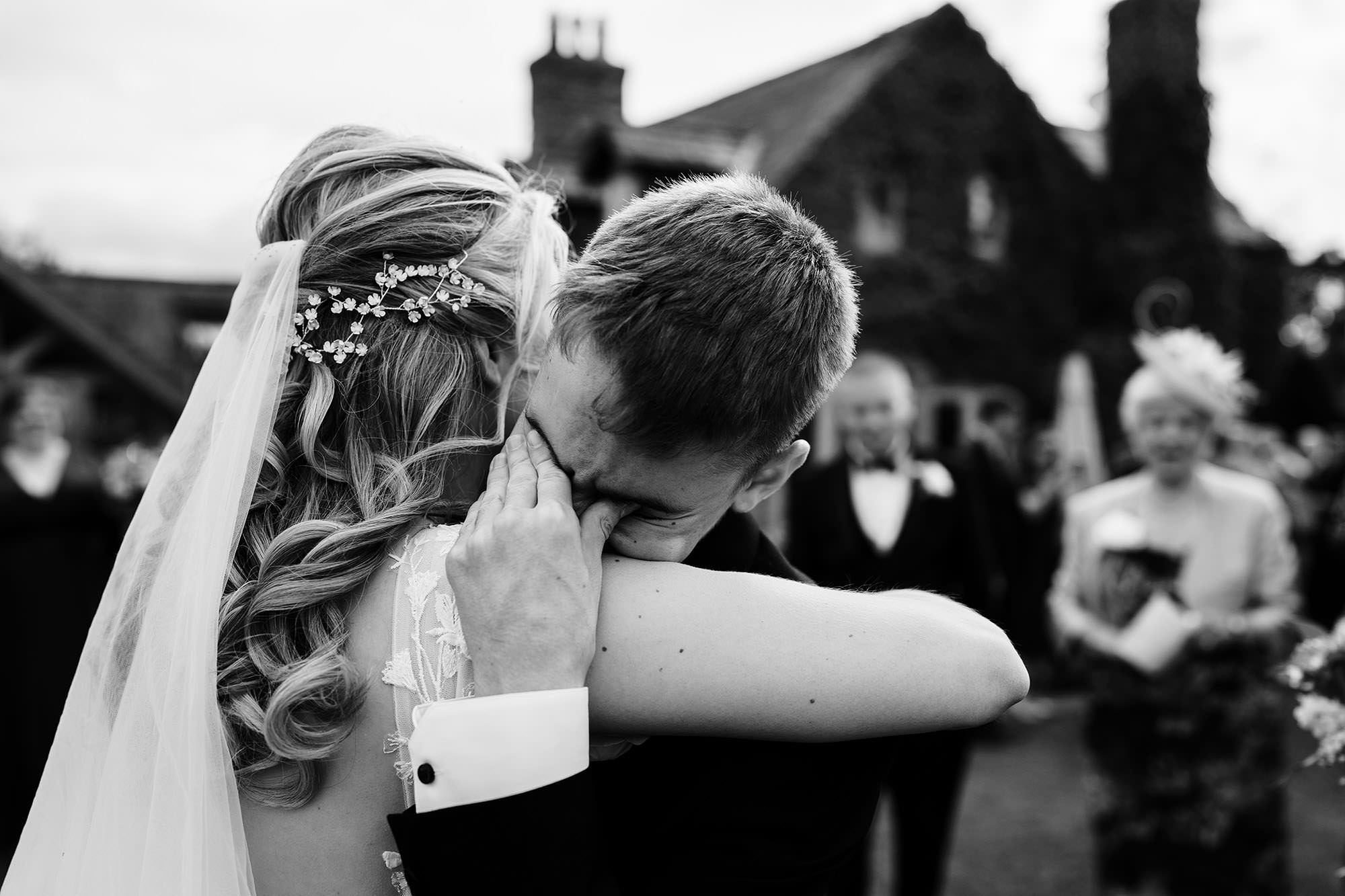 documentary candid moment of wedding guest crying at scarlett hall