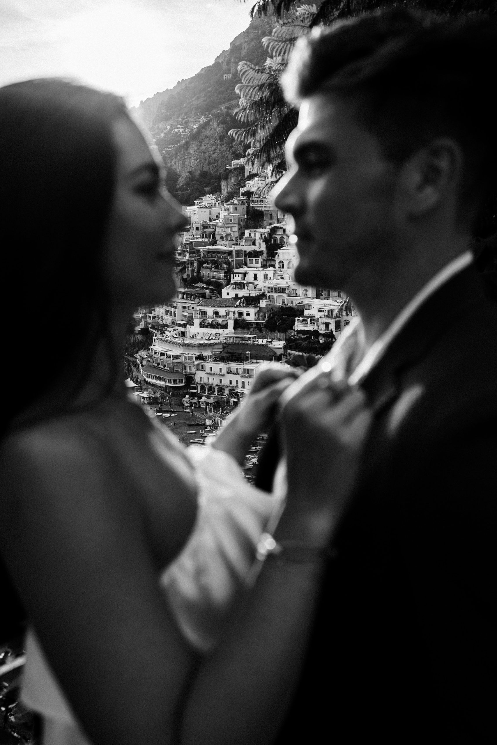 positano seen though couple