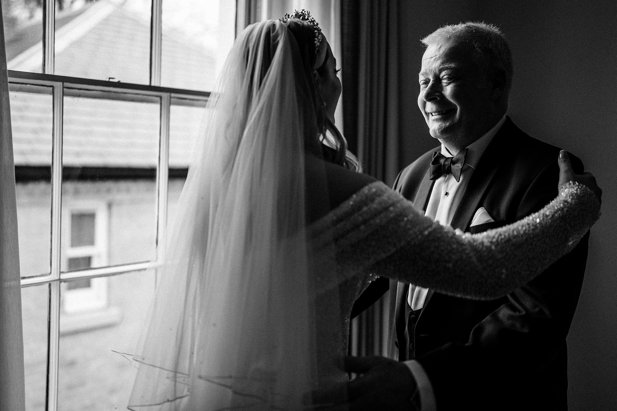 father looknig at his daughter on her wedding day at the granary estates wedding