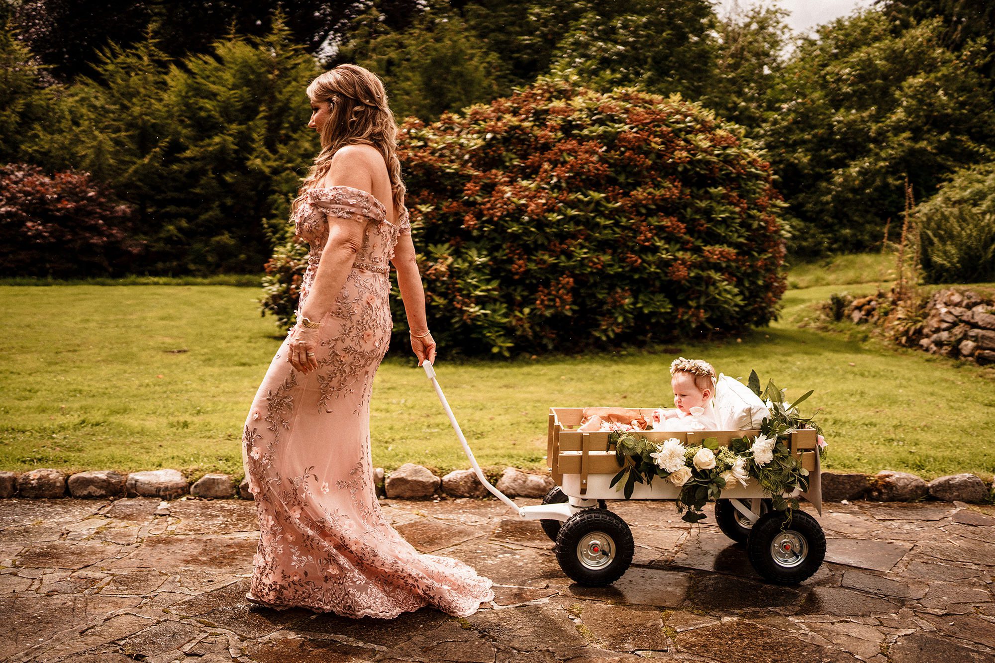 mother of the bride and daugter walking down the aisle at Achnagairn Castle wedding