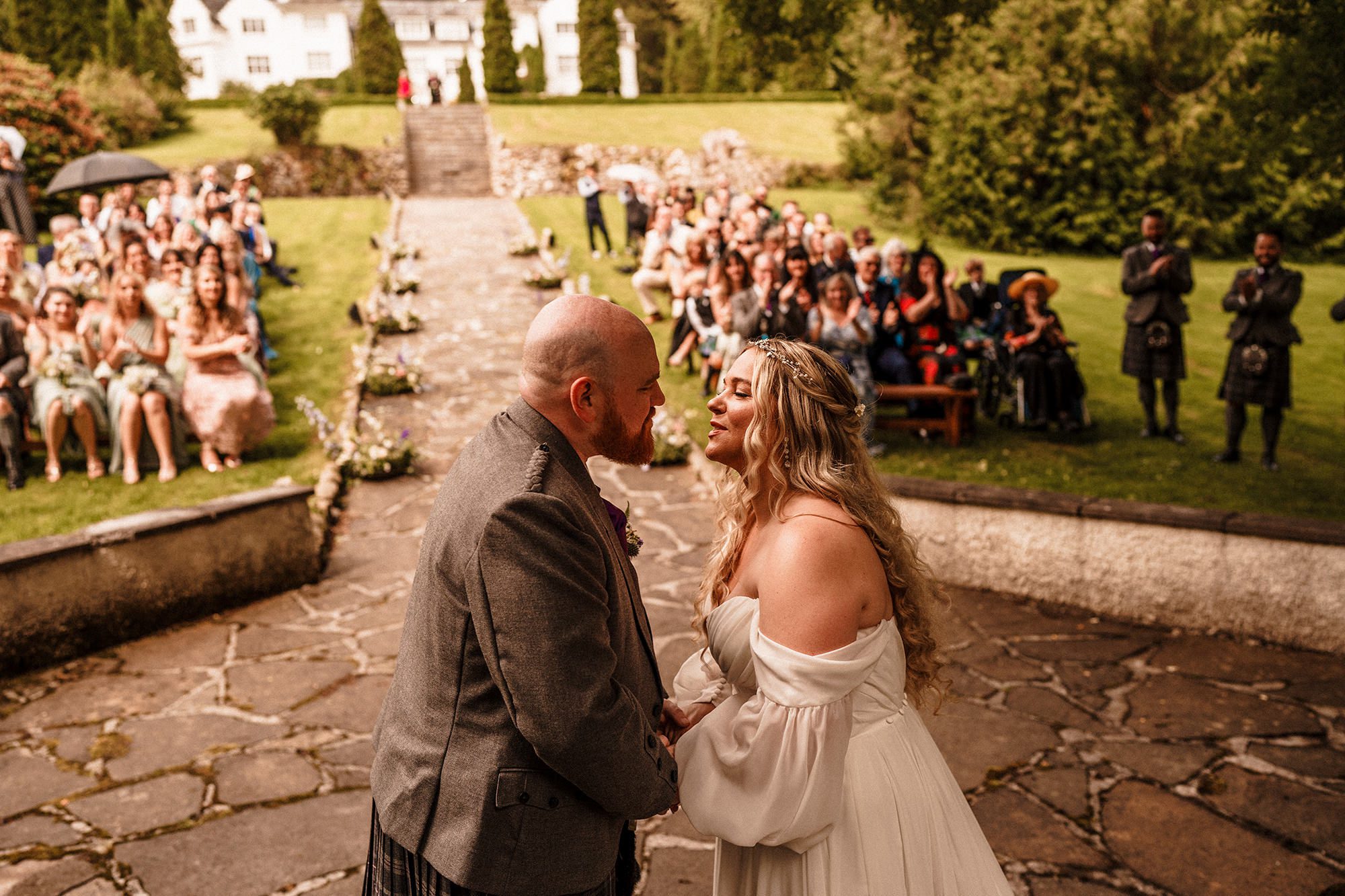 moments before the first kiss after the wedding ceremony at Achnagairn Castle
