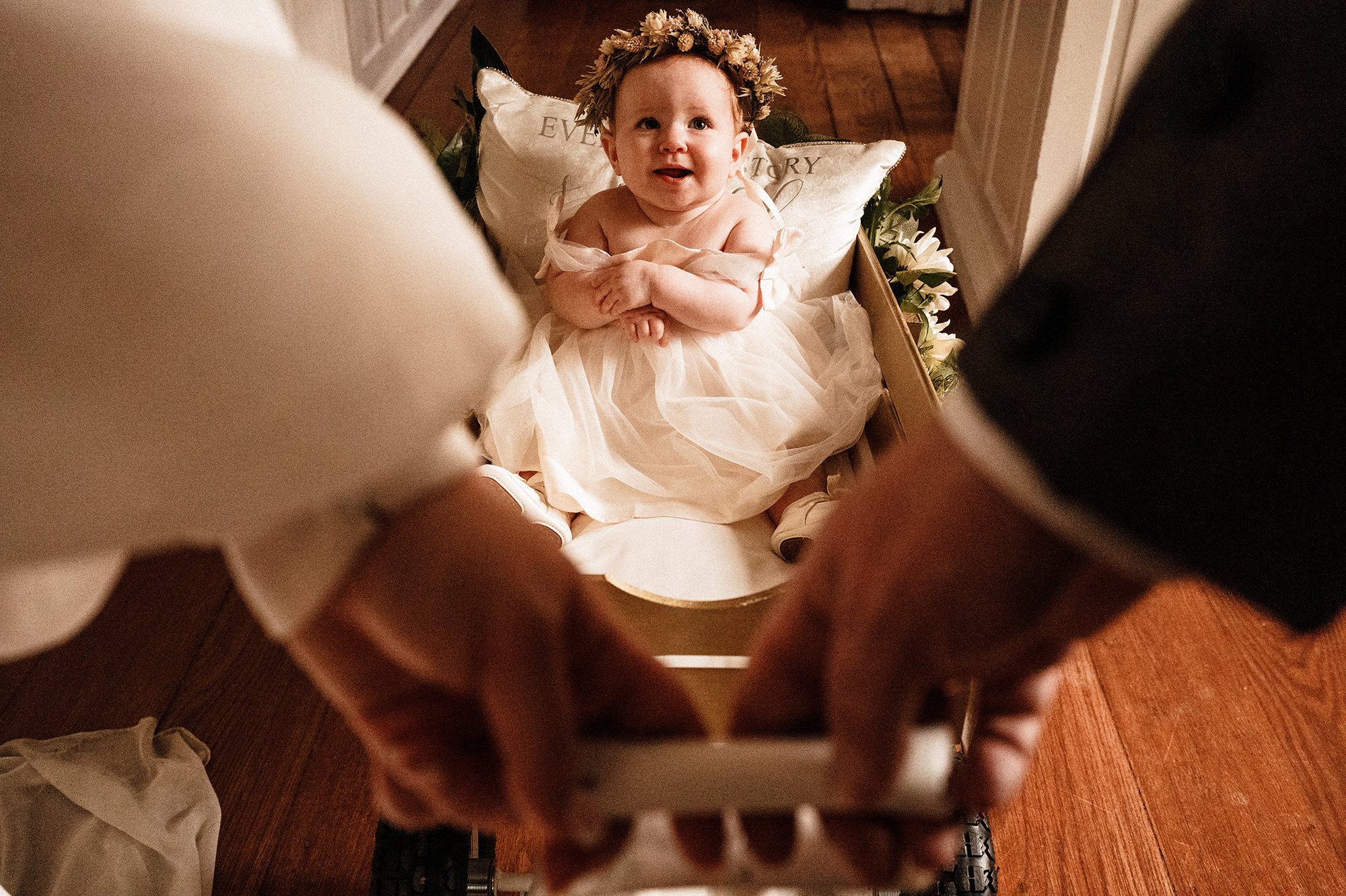 daughter of bride and groom in cart