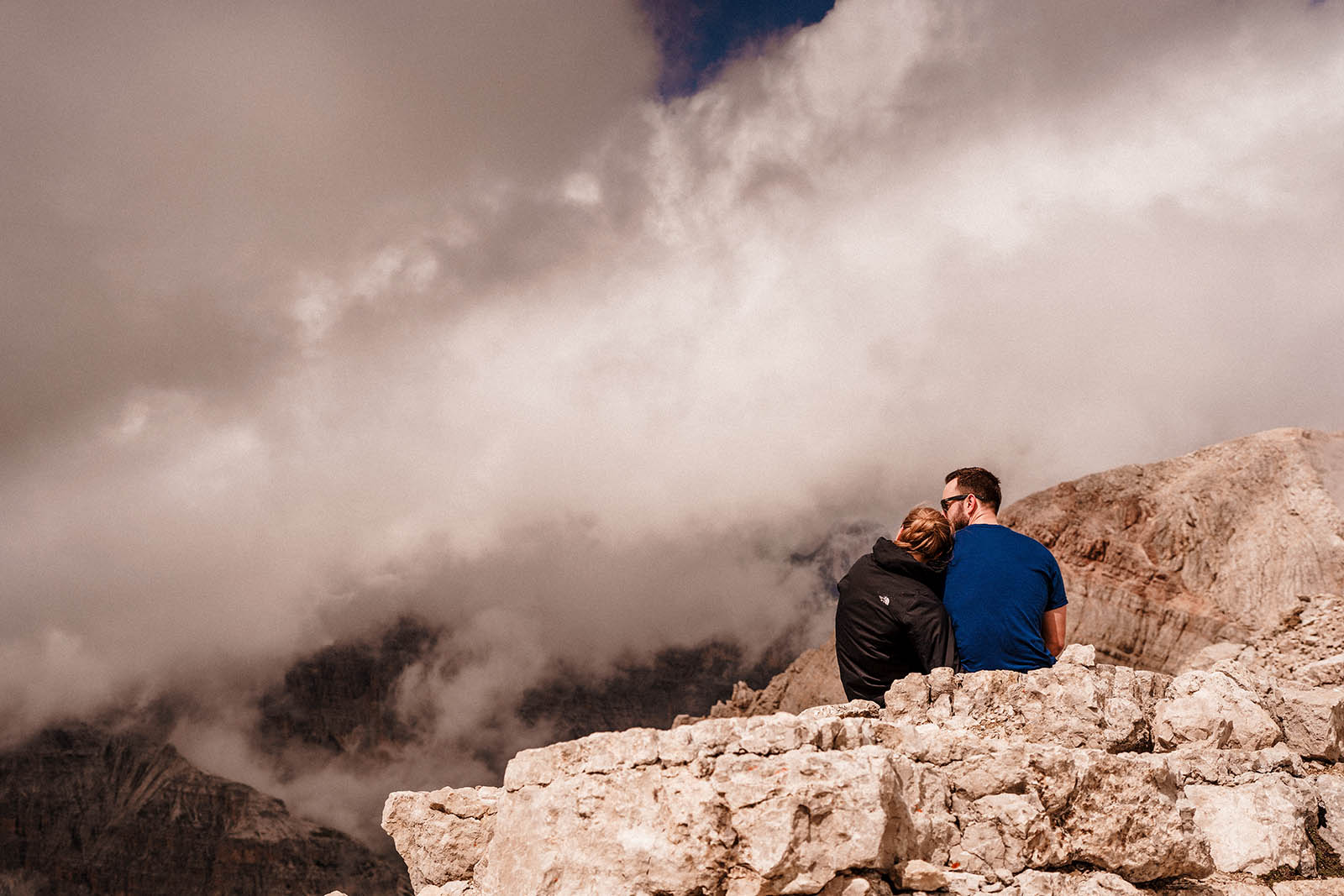couple pose for wedding photo