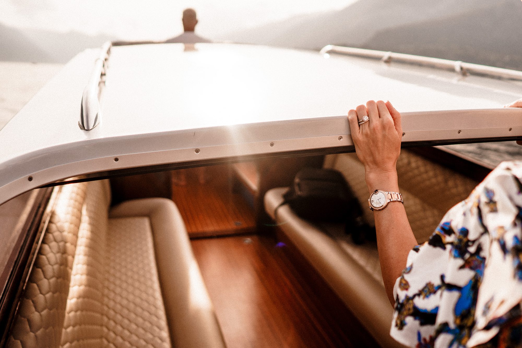 brides hands on boat on lake como