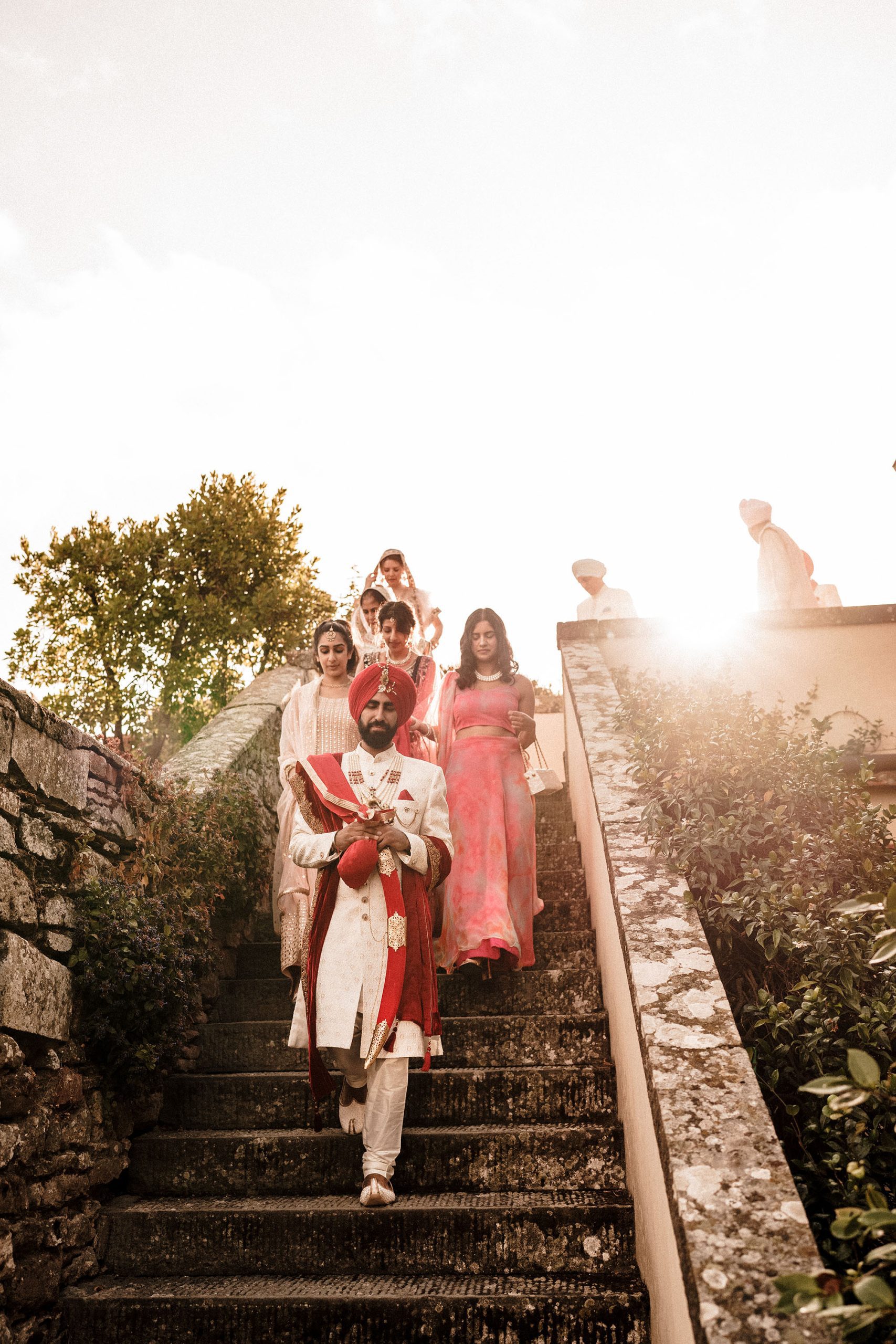 groom walking to his italy wedding in Artimino