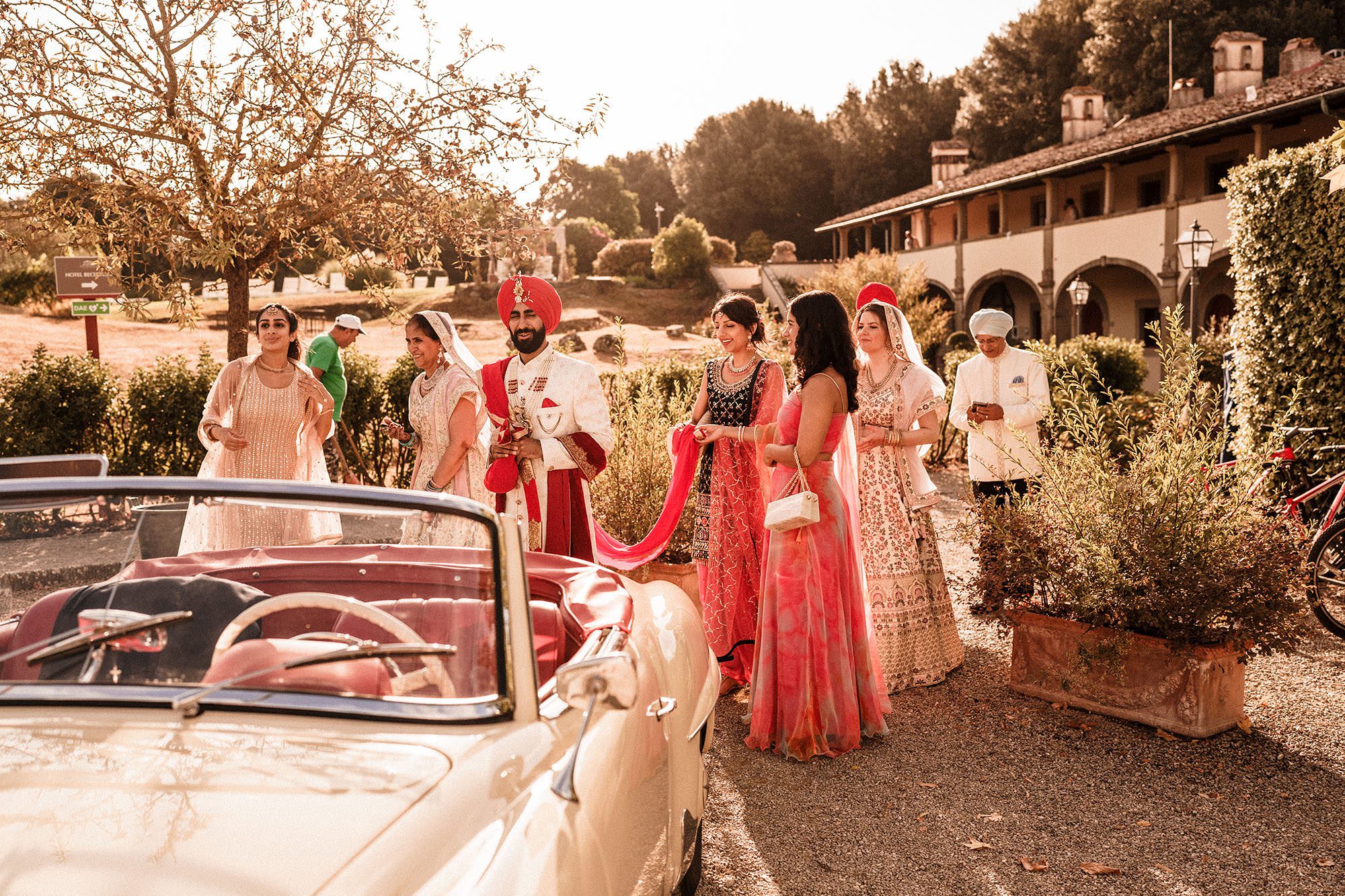 Tenuta di Artimino Wedding Photography of groom getting into the wedding car