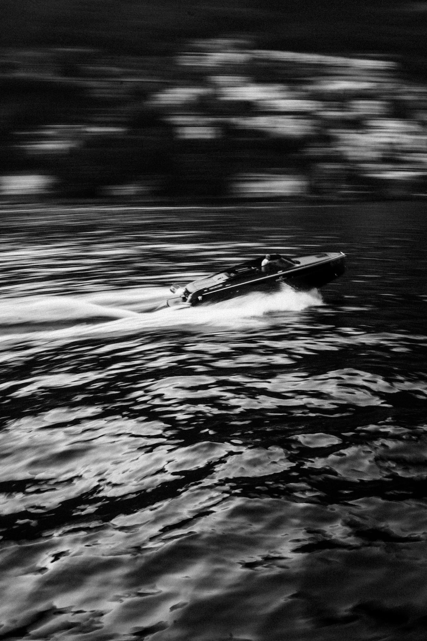 setting the scene with a speedboat on lake como