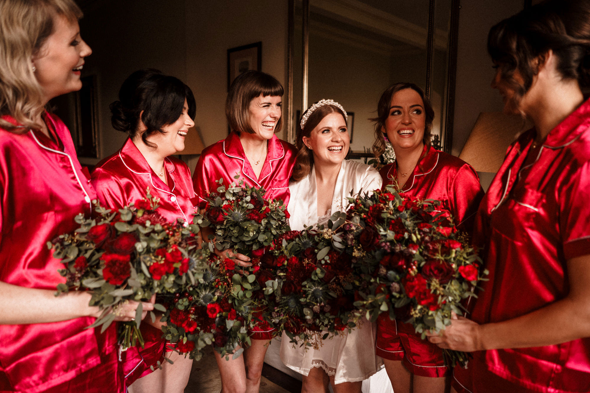 Bridesmaids share a candid moment before the wedding day at mount falcon